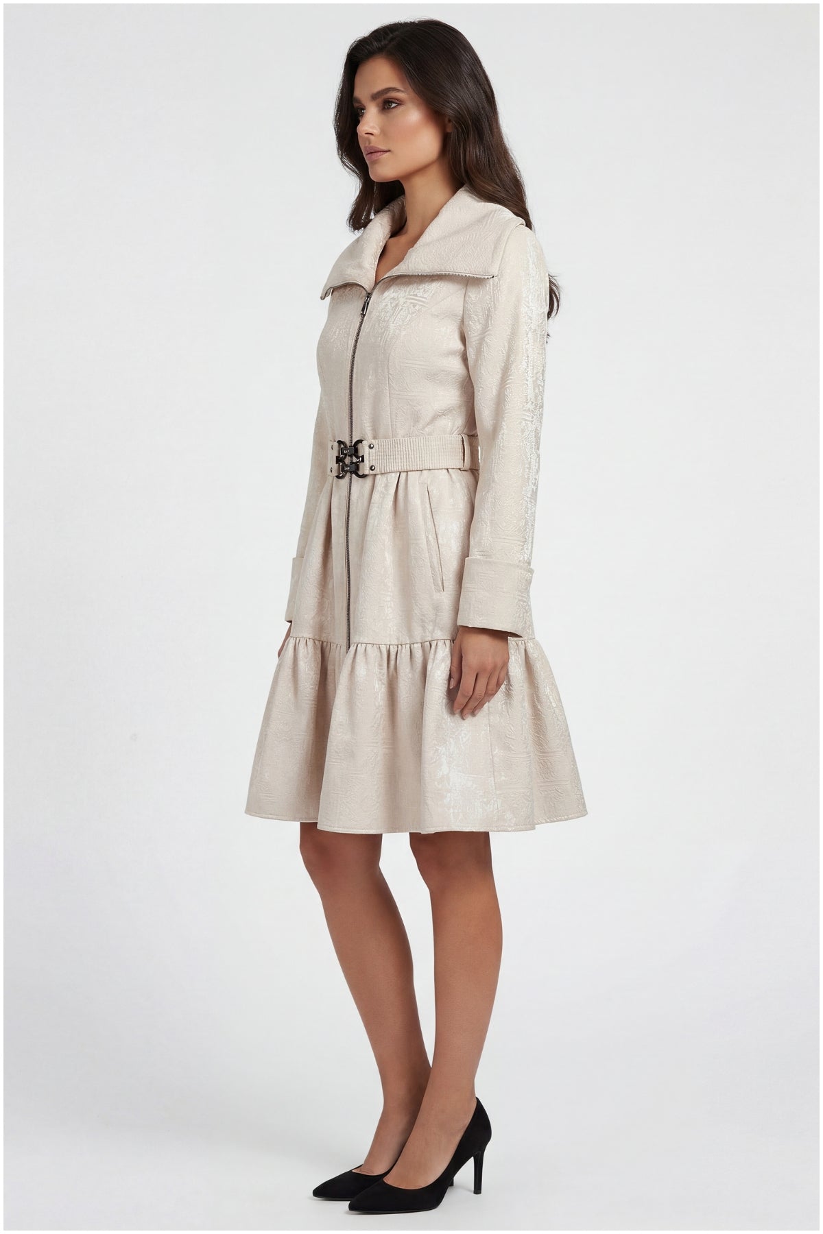 Woman wearing a beige trench coat on a white background