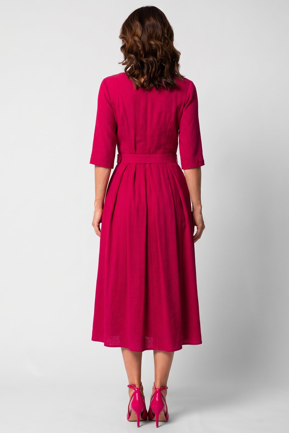 Pink Elegant Midi Dress, Charlotte. Back view on the model, full skirt.