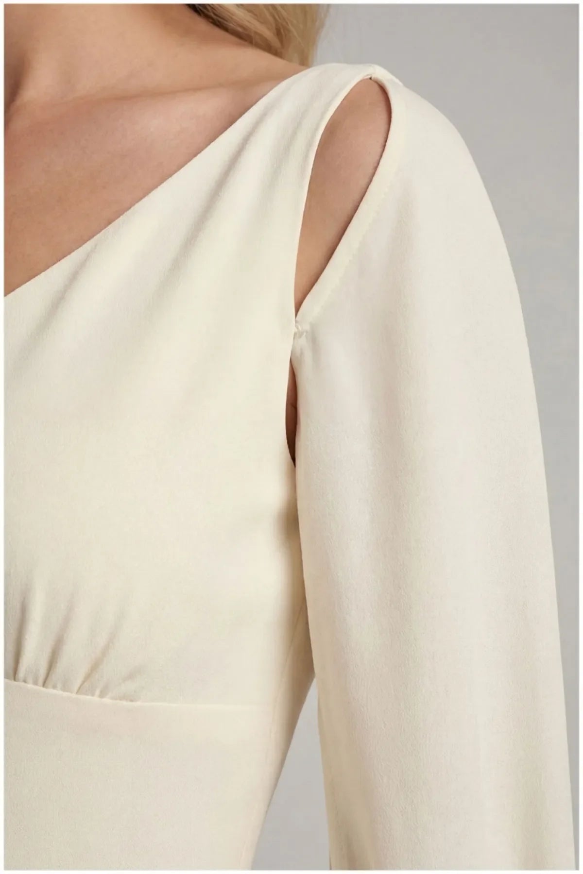 Detail of the Rebeka sheer cape sleeve split at the shoulder over the ivory bodice