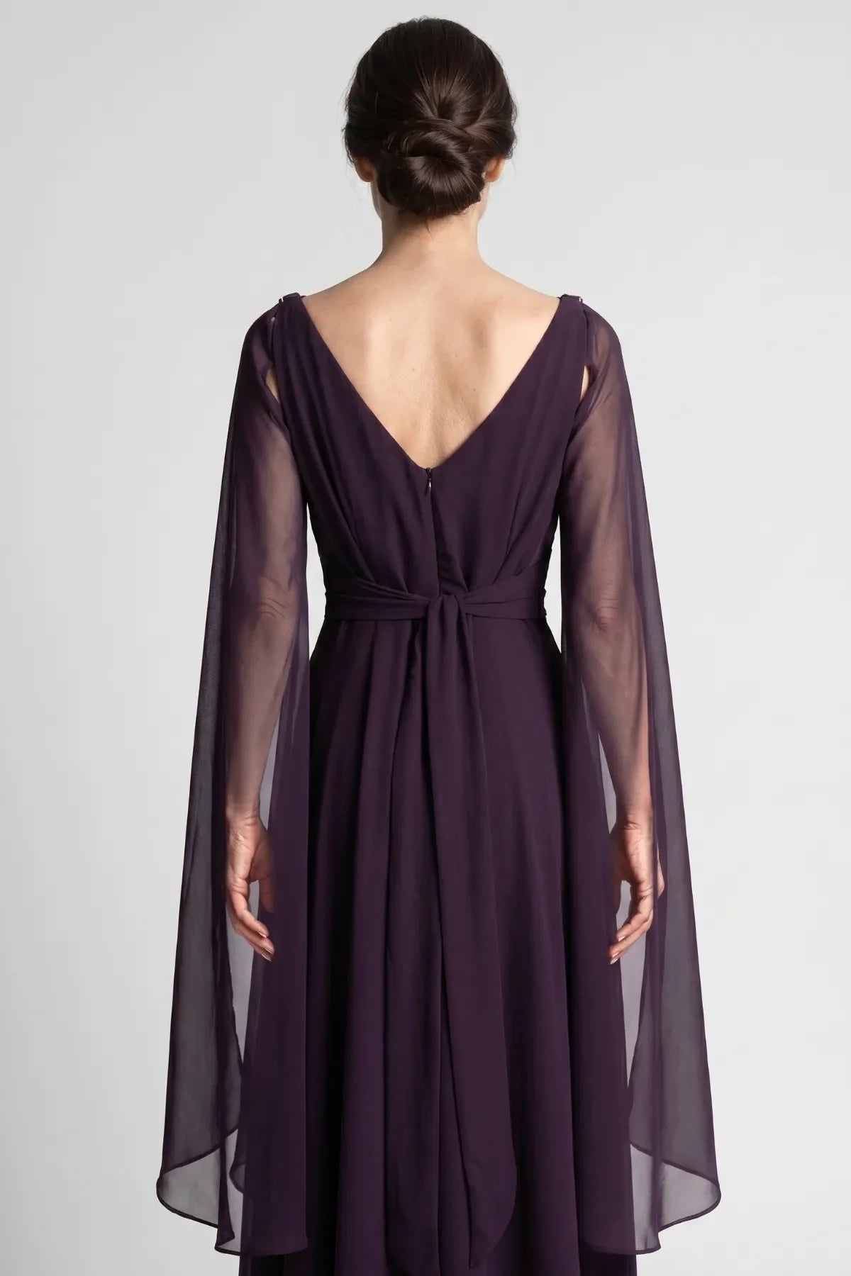 Detail of the Rebeka gathered empire bodice, waist belt and sheer chiffon drape sleeve in deep plum