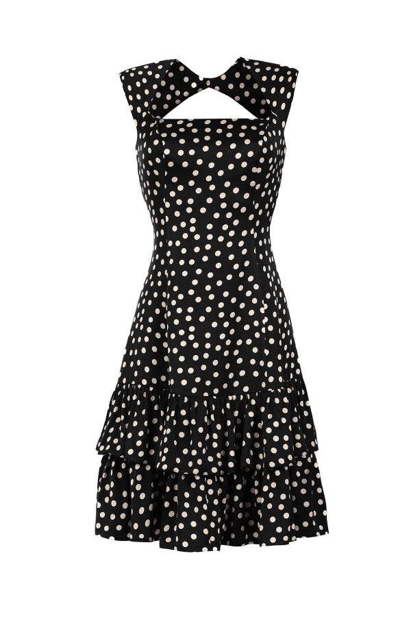 Black satin ruffle satin dress, sleeveless with ivory polka dots, fitted bodice, cutout neckline, and tiered ruffle hem