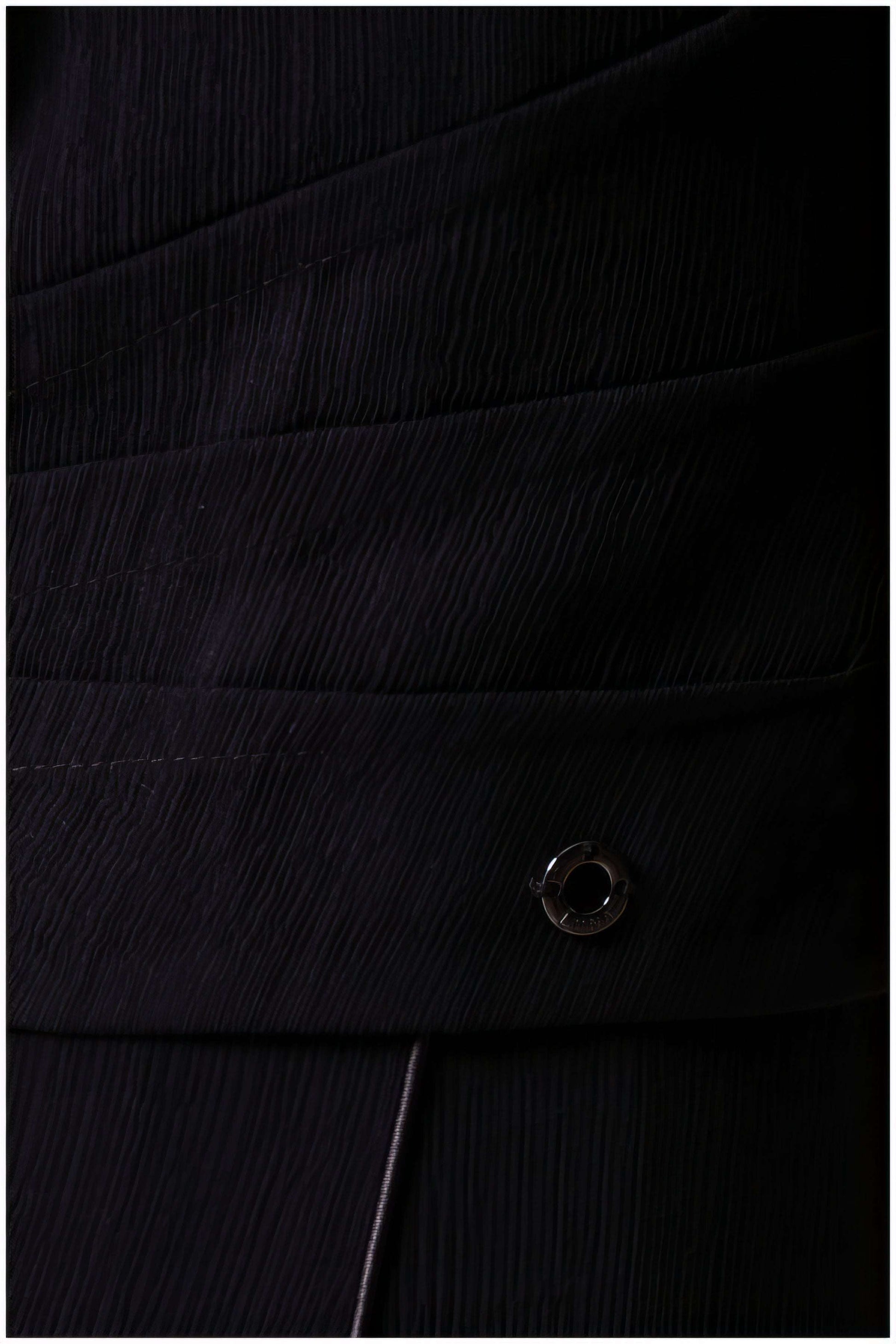 Close-up of textured fabric and button detail on the Rina Cropped Blazer by Luna Fashion House