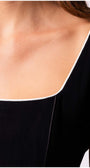 Close-up detail of the neckline on the Rina Elegant Midi Dress in Black by Luna Fashion House