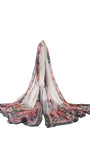 Lightweight pure silk floral scarf Loretta with floral print and delicate contrasting border, elegant draped style.