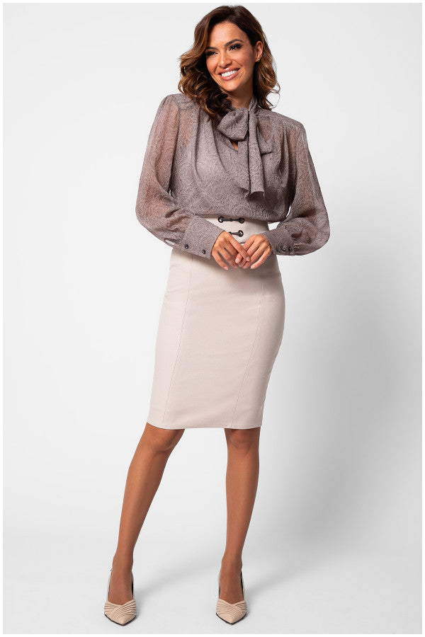 Woman wearing a gray blouse with a bow and a beige skirt on a white  background Luna Fashion House