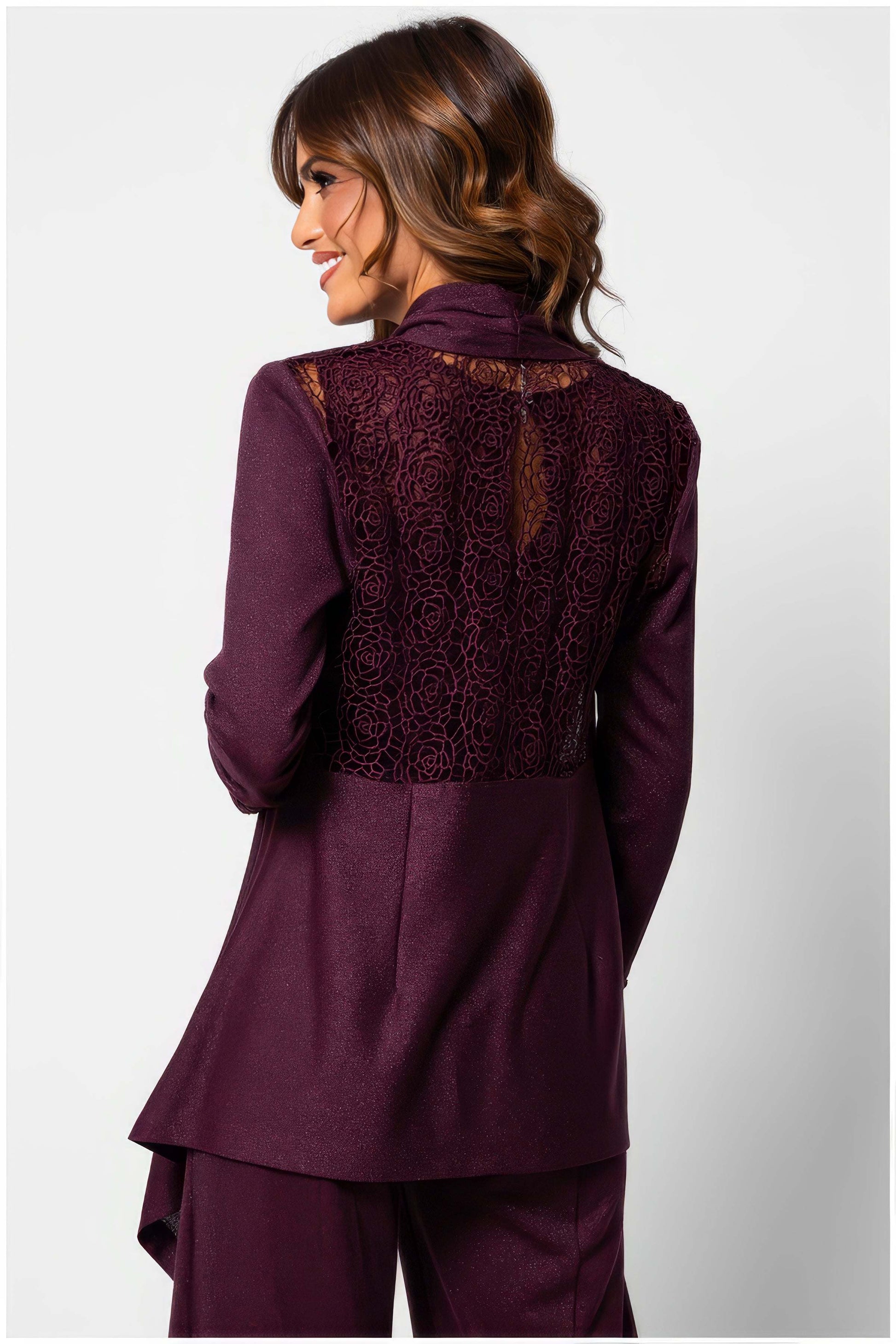 Woman wearing Jody Lace Cardigan in Bordeaux showing detailed lace back design with long sleeves and elegant fit