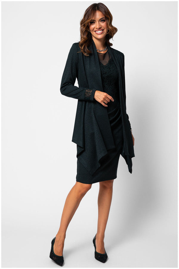 Woman wearing a black dress with a matching jacket on a white background Luna Fashion House