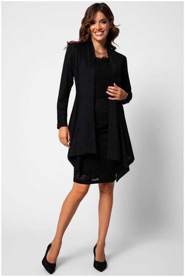 Woman wearing black lace cardigan Jody in Noir with lace detailing, draped open front, styled with fitted black dress and heels