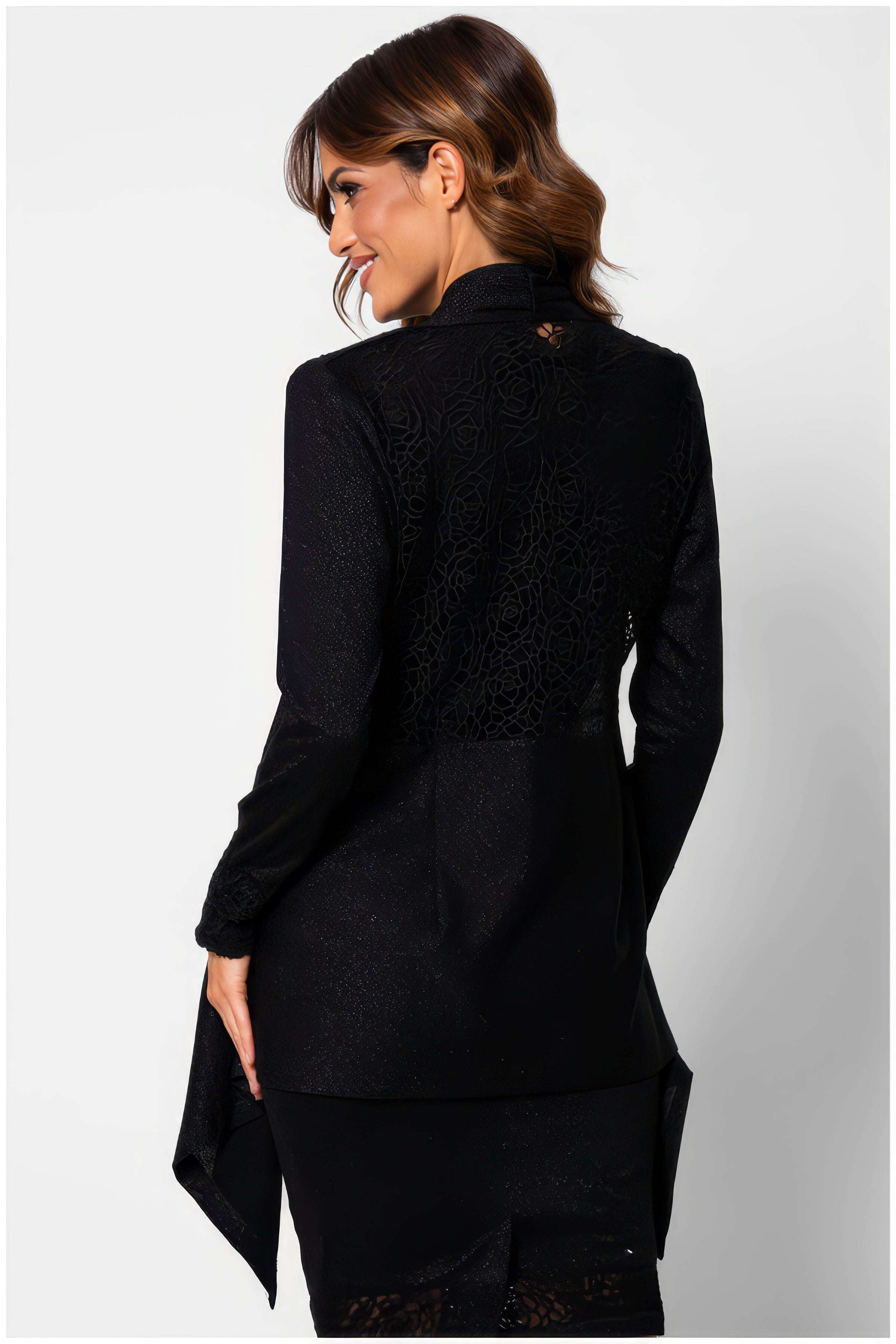 Woman wearing Jody Lace Cardigan in Black by Luna Fashion House showcasing elegant lace detail on the back and long sleeves
