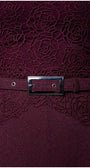 Close-up of Bordeaux Lace Overalls and tonal belt with silver buckle on Overall Jody jumpsuit