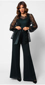 Woman wearing a Midnight Green lace bodice Lace Overalls with sheer sleeves and wide-leg trousers, styled with a matching belt.