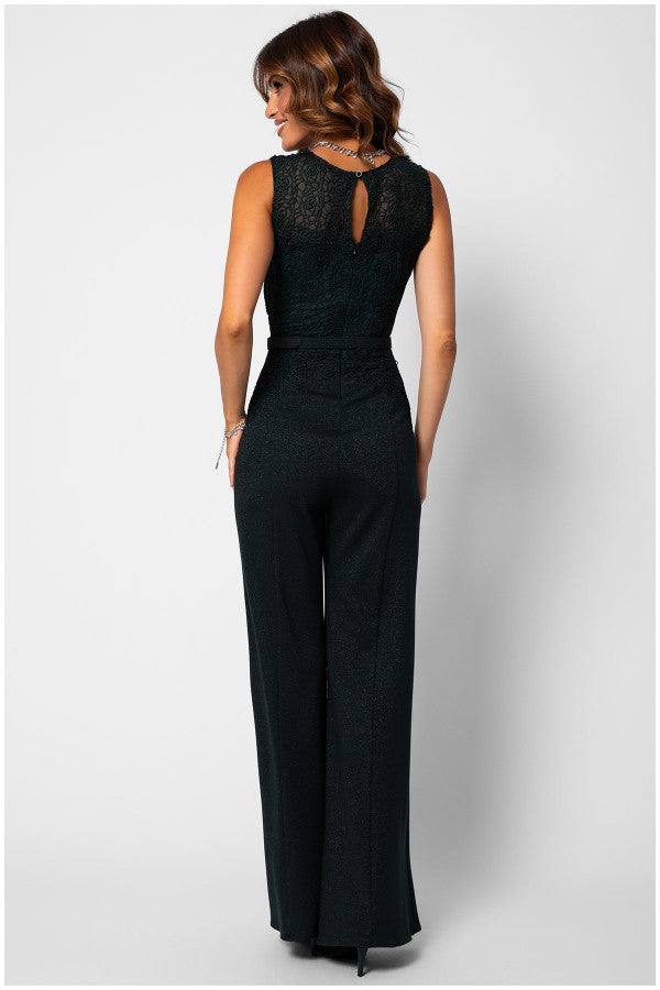 Woman wearing elegant midnight green lace sleeveless Lace Overalls with wide-leg trousers and matching belt, seen from the back
