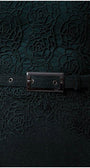 Close-up of Midnight Green Lace Overalls and matching belt with metallic buckle on the Overall Jody jumpsuit