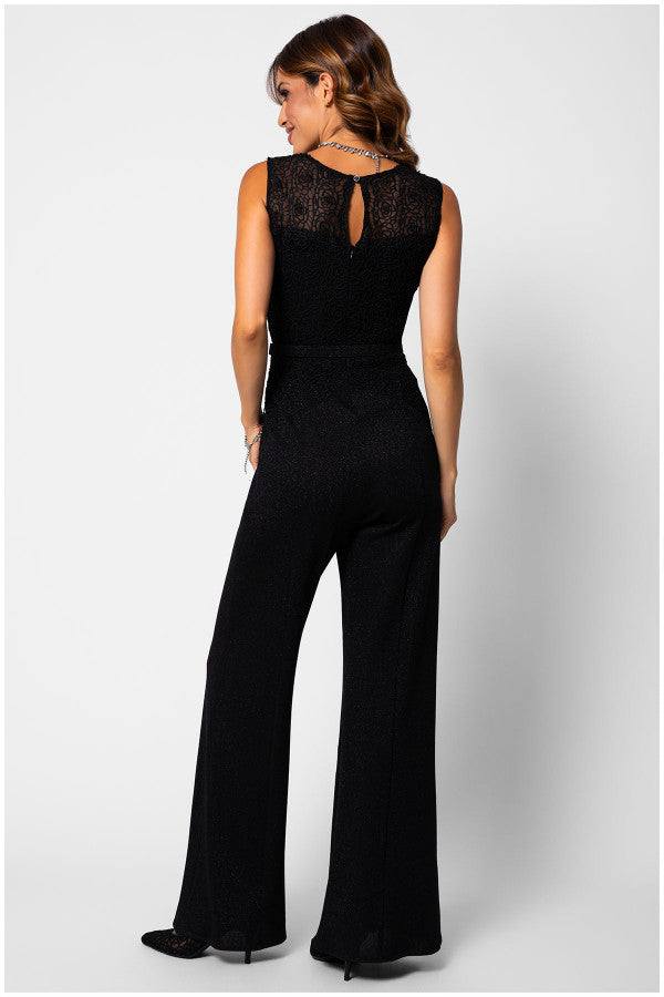 Woman wearing black Lace Overalls and wide-leg trousers couture-inspired jumpsuit with tonal belt, back view on white background