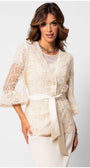 Elegant woman wearing Jody Lace Belted Sweater in Ivory with detailed floral lace and satin waist tie from Luna Fashion House