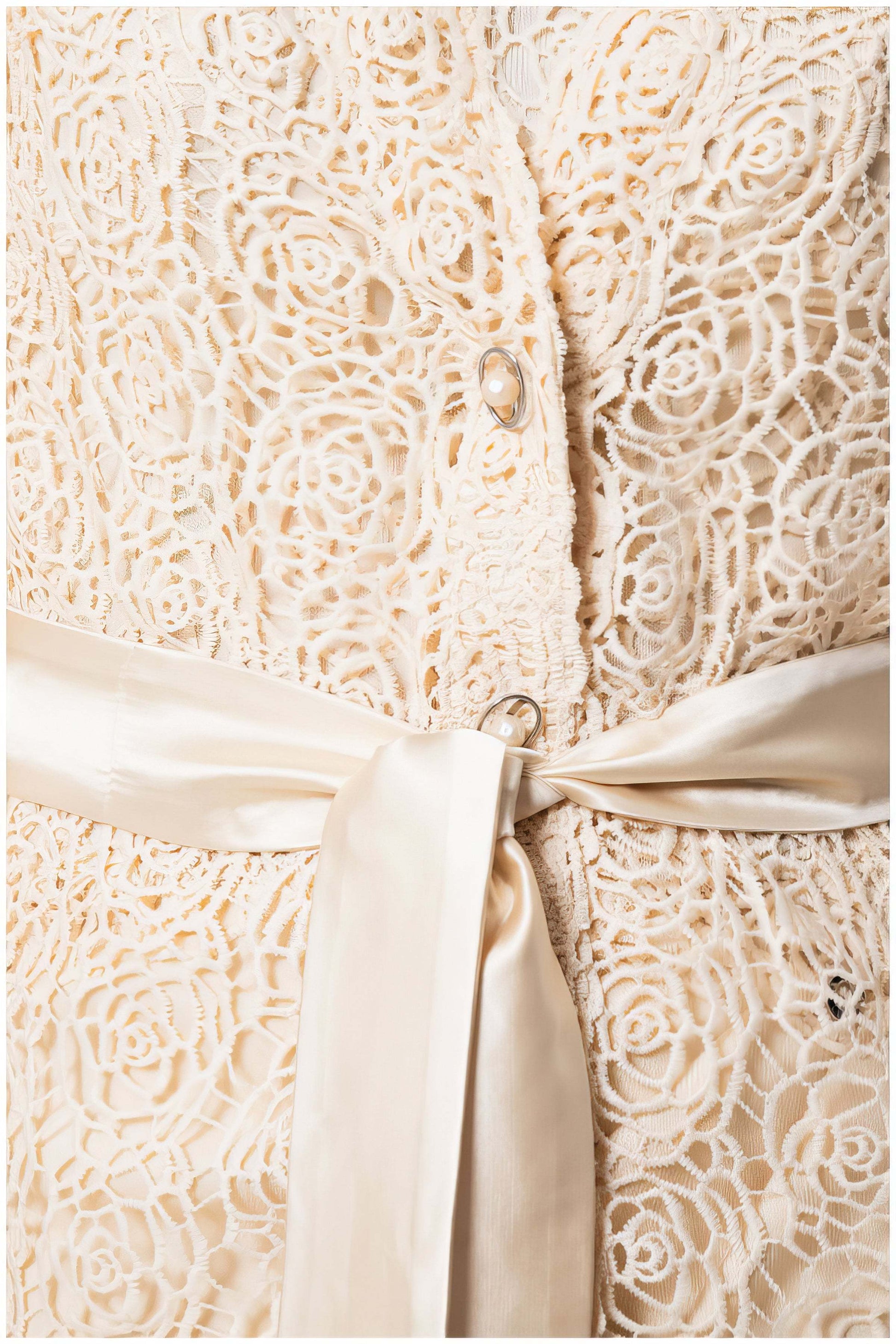Close-up of intricate lace detail and satin belt on Jody Lace Belted Sweater in Ivory by Luna Fashion House