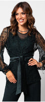 Woman wearing a Midnight Green lace cardigan Sweater Jody with semi-sheer sleeves and a satin waist tie.