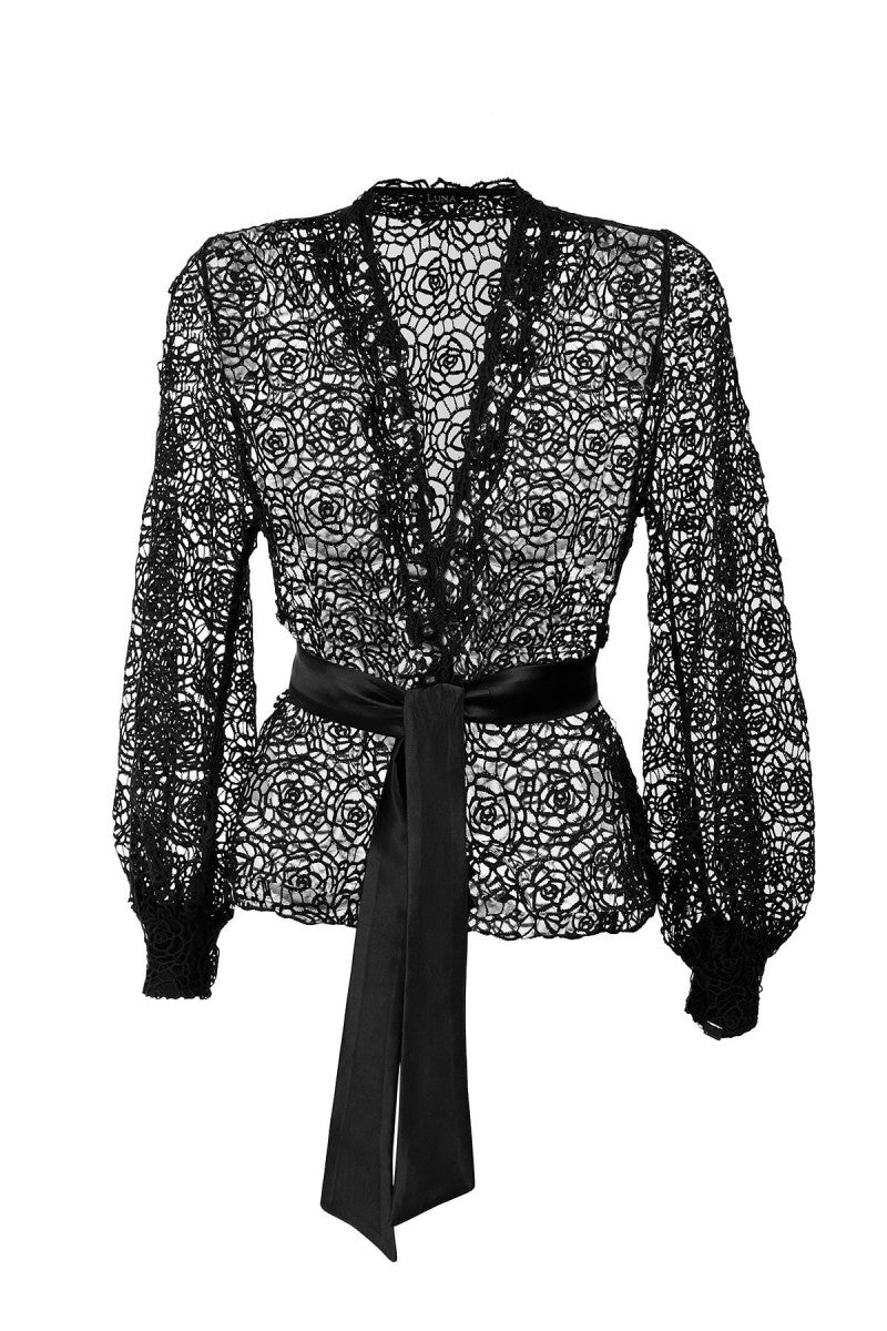 Black lace blouse with a black ribbon on a white background
