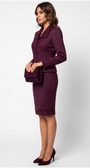 Woman wearing a purple suit with a white background