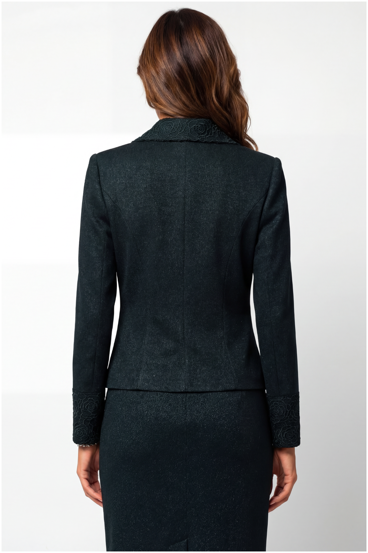 Dark gray suit worn by a person on a white background