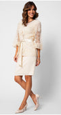 Woman wearing an elegant ivory fitted lace cocktail dress with soft draped waist and short lace sleeves, styled with matching heels.