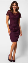 Woman wearing a bordeaux elegant midi dress fitted Bordeaux lace dress with short sleeves and a tailored silhouette, perfect for elegant occasions.