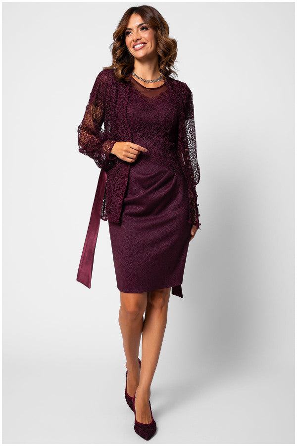 Woman wearing a fitted bordeaux elegant midi dress lace dress with short sleeves and a matching lace overlay cardigan and heels
