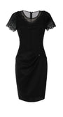 Black Lace Cocktail Dress, Jody. Photographed on its own, front, with the illusion neckline.
