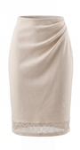Beige skirt with lace trim on a white background