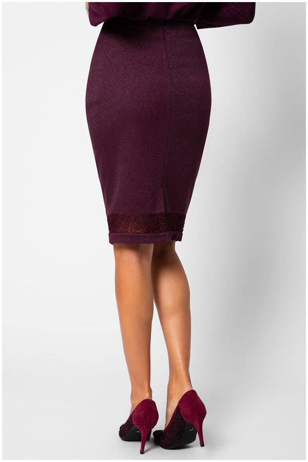 Back view of a woman wearing a Bordeaux pencil skirt with lace hem and matching high heels against a white background