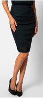 Midnight green pencil skirt with lace hem insert, tailored silhouette, and draped waistline for elegant style.