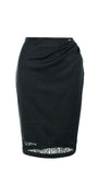 Midnight green pencil skirt with draped waist and lace hem insert for elegant, modern sophistication.