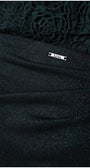 Close-up of Midnight Green lace and fabric details on the Skirt Jody with Luna brand tag visible.