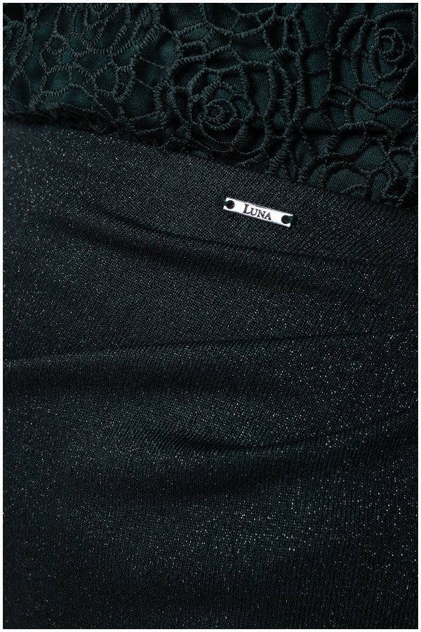 Close-up of Midnight Green lace and fabric details on the Skirt Jody with Luna brand tag visible.