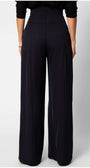 Back view of woman wearing Agatha High Waisted Wide Leg Pants in Black by Luna Fashion House