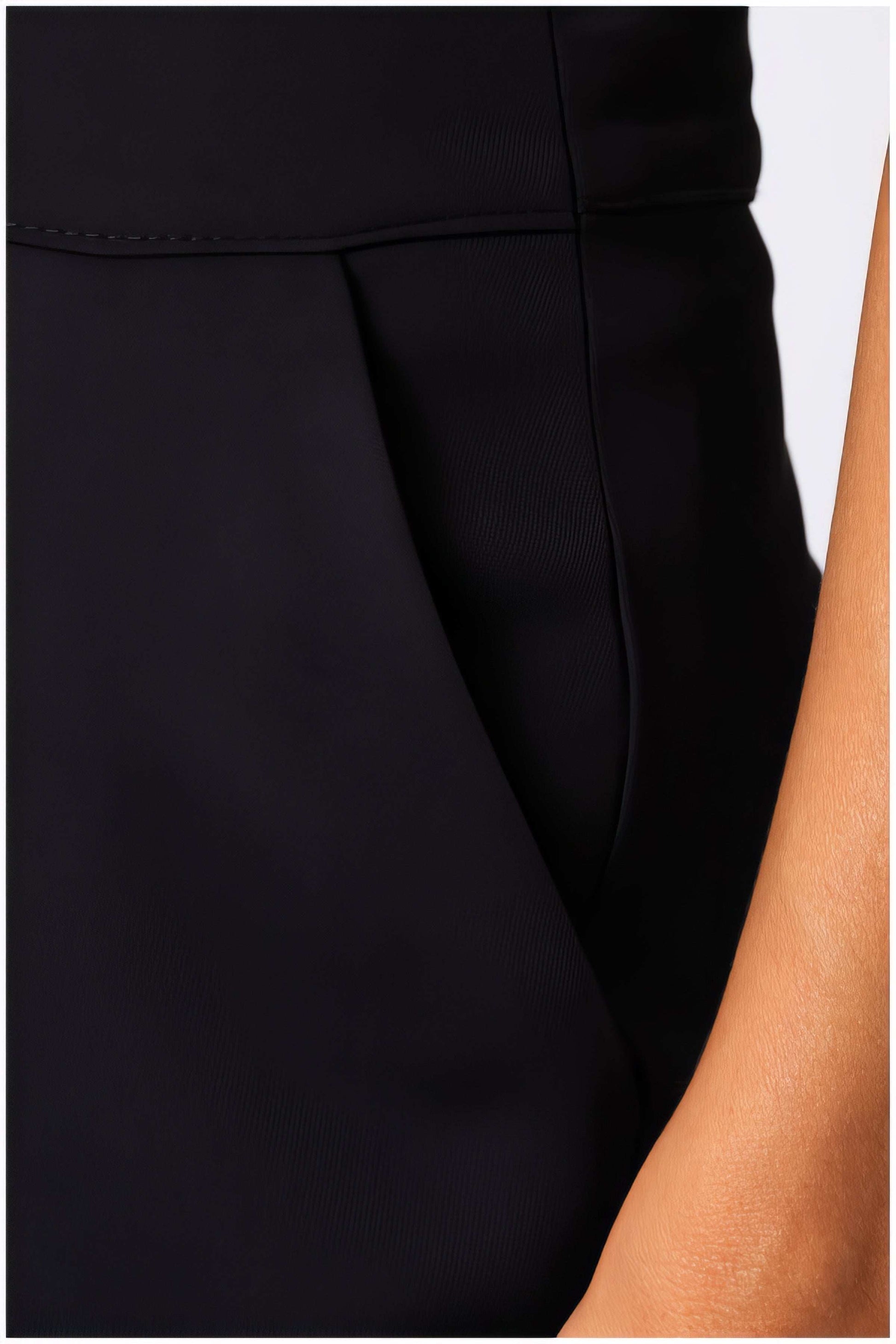 Close-up detail of black fabric and pocket of Agatha High Waisted Wide Leg Pants in Black by Luna Fashion House