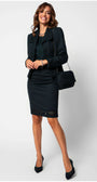 Woman wearing Jody Elegant Lace Blouse in Midnight Green paired with a black skirt and blazer, smiling confidently