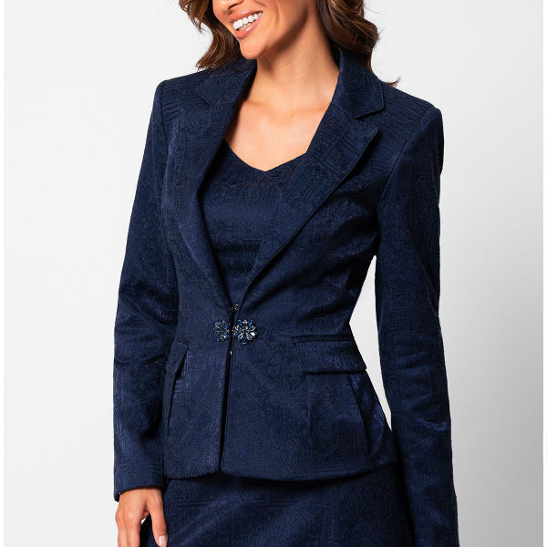 Woman wearing a navy blue suit on a white background