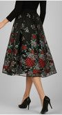 Black floral skirt with red and green flowers on a gray background Luna Fashion House