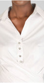 White blouse with buttons on a neutral background