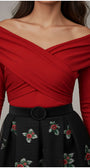 Red off-shoulder top with a black Luna Fashion House skirt featuring floral embroidery on a neutral background
