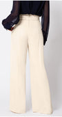 White wide-leg Luna Fashion House  pants worn with a black top on a white background
