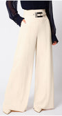 Beige wide-leg Luna Fashion House pants worn with a dark top on a white background