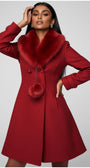 Red coat with fur collar worn by a model on a gray background