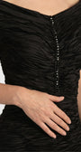 Detail of the Lina dress showing the slim vertical crystal trim and the ruched fabric texture across the bodice