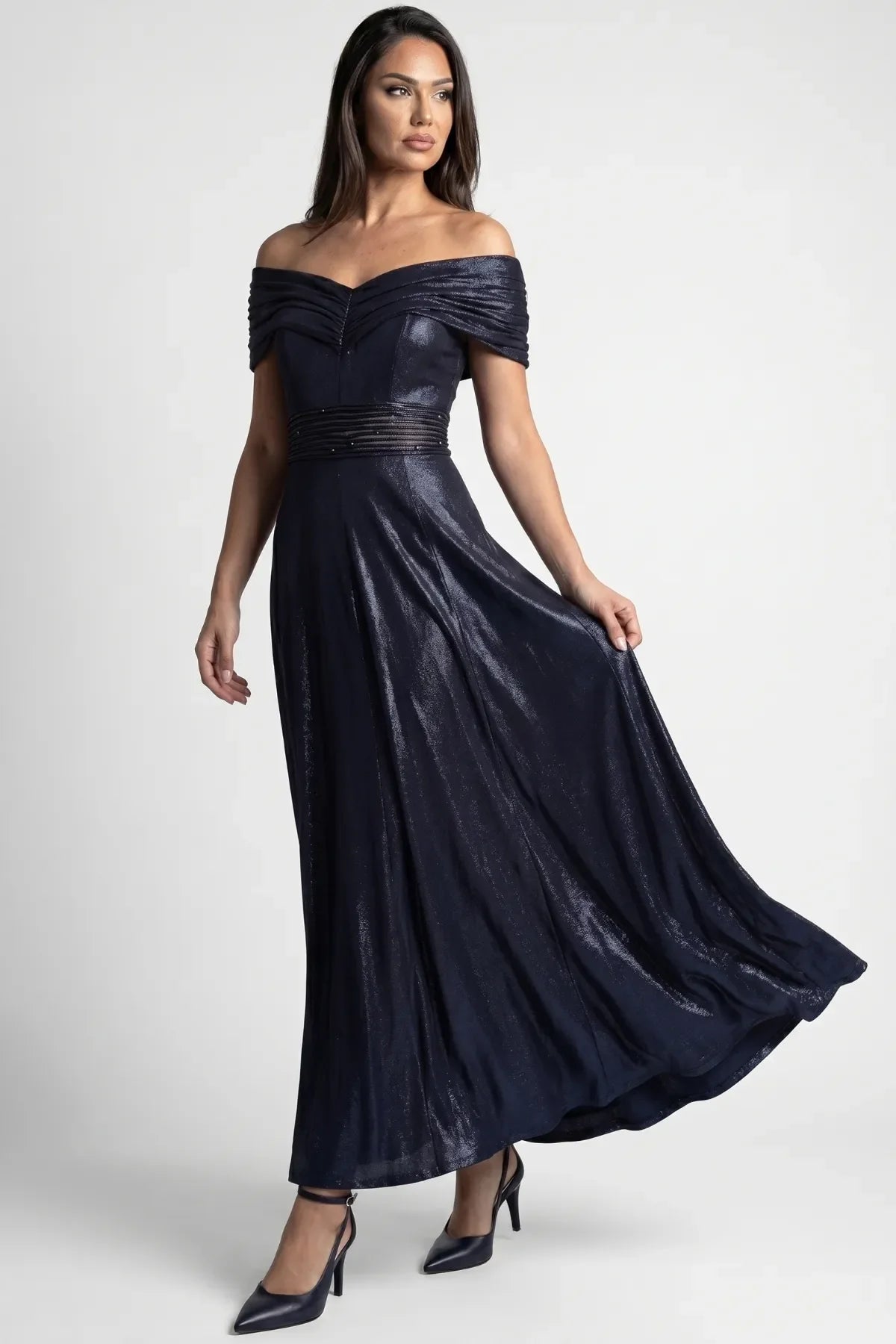 Iris Off-Shoulder Maxi Gown in navy with pleated neckline, beaded waist and flowing metallic skirt