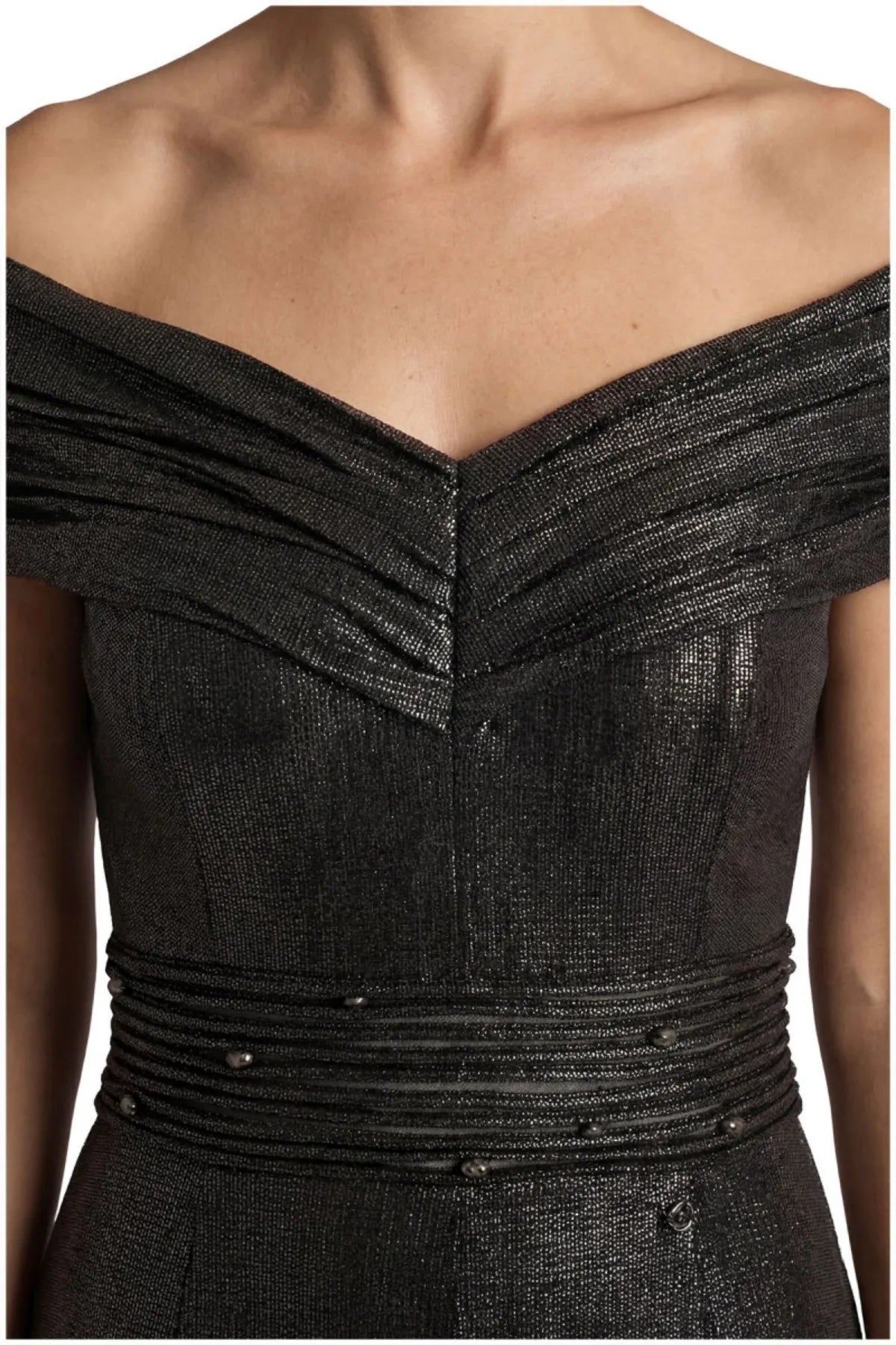 Draped off-shoulder neckline and tiered sheer waist band set with small dark crystals on anthracite metallic fabric