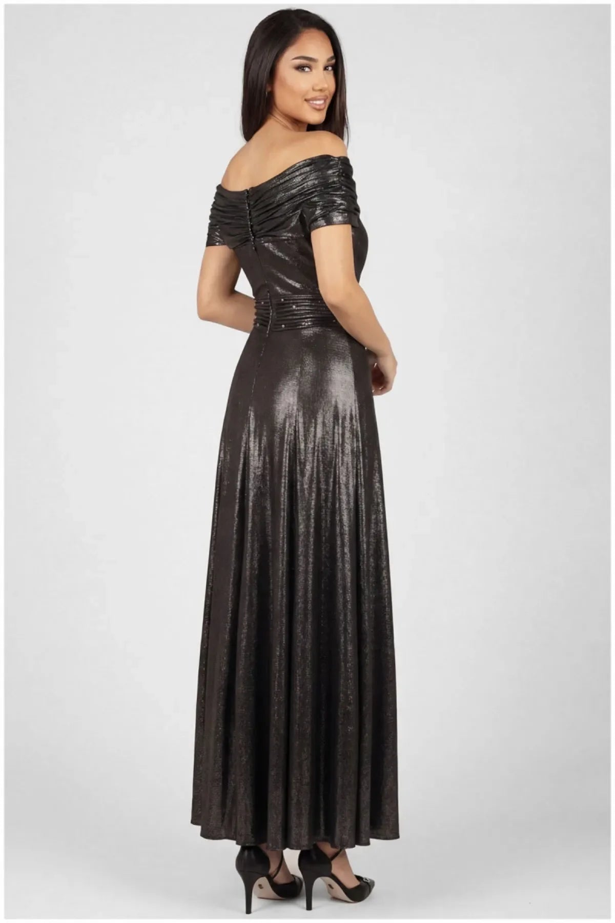 Back of anthracite metallic off-shoulder maxi gown showing draped bodice, hand-finished button placket, and flowing skirt