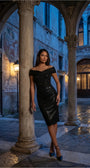 Model wearing the anthracite cocktail dress in a European courtyard at blue hour, framed by stone arches and lanterns.