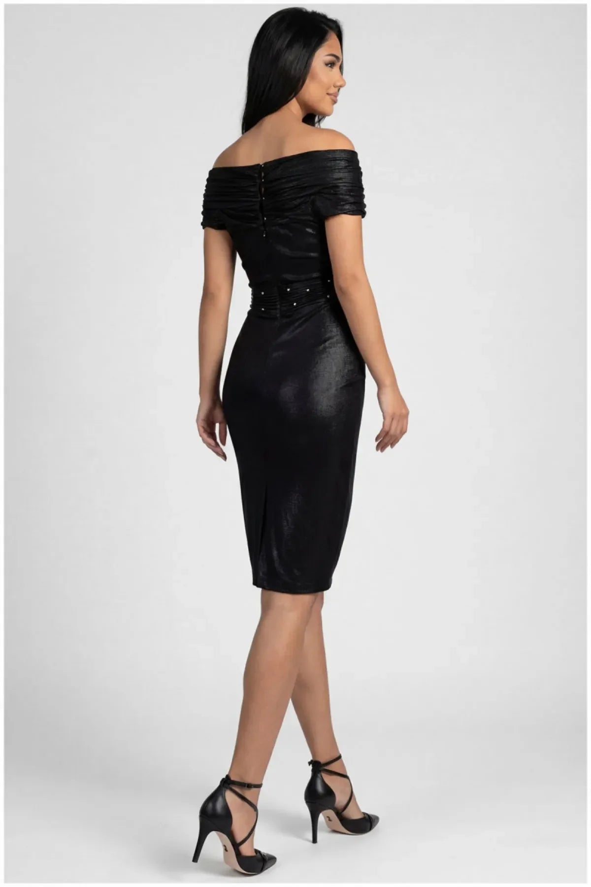Back view of the anthracite cocktail dress showing the small button closure and fitted pencil silhouette.